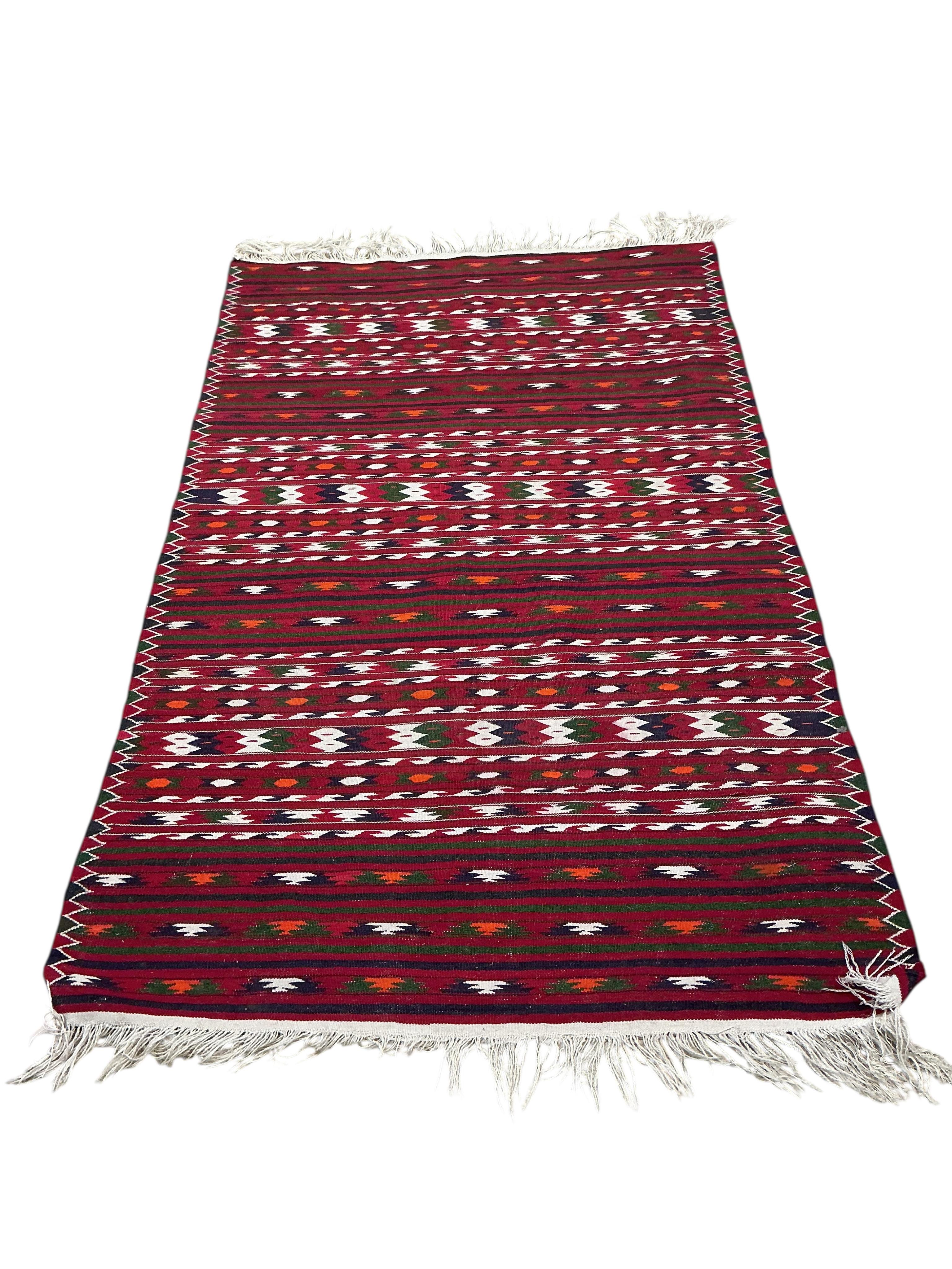 A Kilim flatweave red ground rug, 190 x 120cm